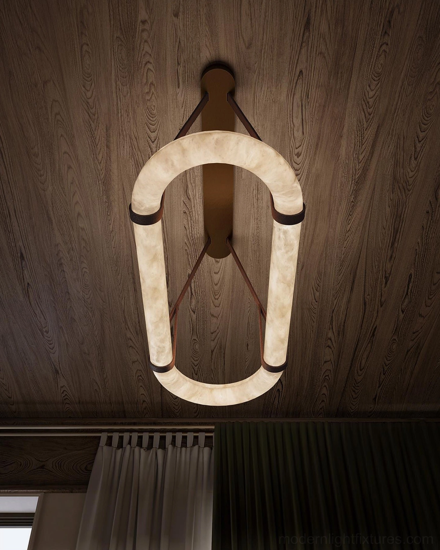 Kurve alabaster wall lamp with U-shaped ring design mounted on wooden accent wall interior, front flat view