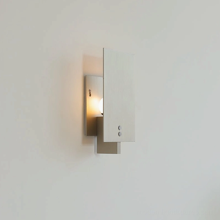 Kyren minimalist wall lamp detail shot showing brass glass construction and geometric form