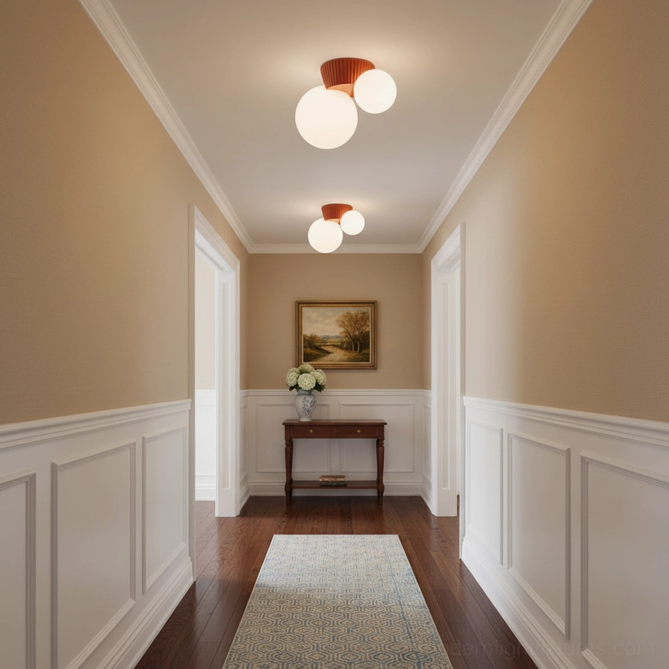 Land textured resin ceiling light with terracotta ribbed canopy and white glass globes in wainscoted hallway