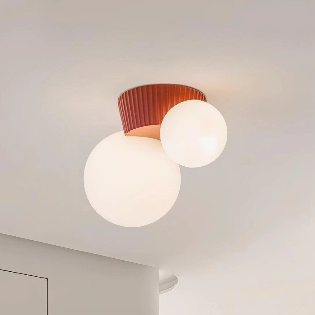 Land green resin ceiling fixture creating focal point lighting in artistic modern interior