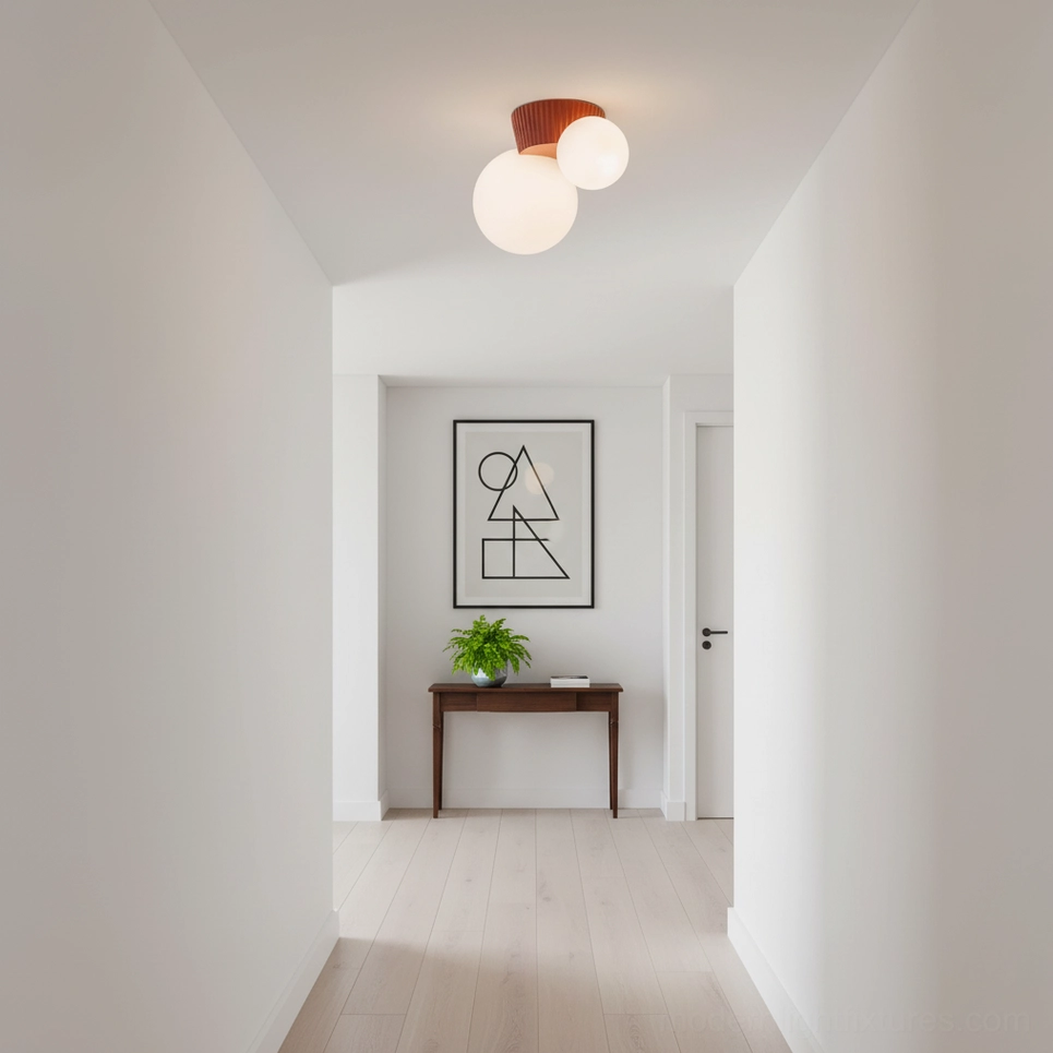 Land ceiling light with organic textured design and dual-sphere configuration in bright studio setting
