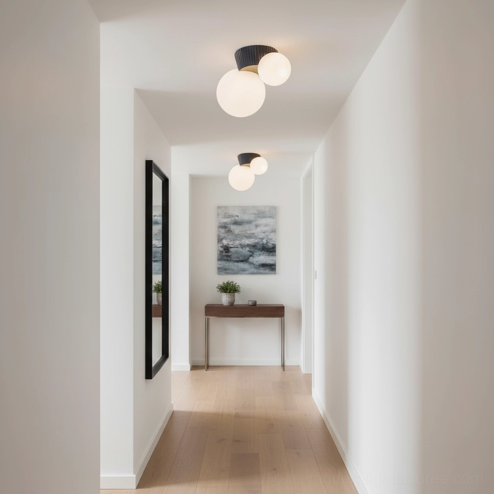 Pair of Land ceiling light fixtures with green textured bases creating symmetric hallway illumination