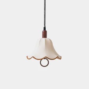 Lanna petal pendant light with fabric shade and wooden top accent displayed against white studio background, showing ruffled petal design details