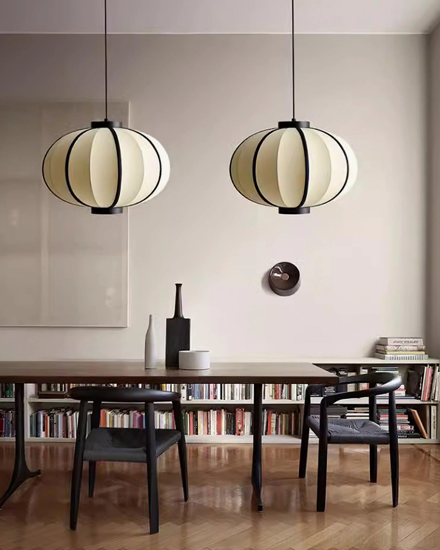Contemporary fabric lantern pendant with warm ambient lighting in home setting