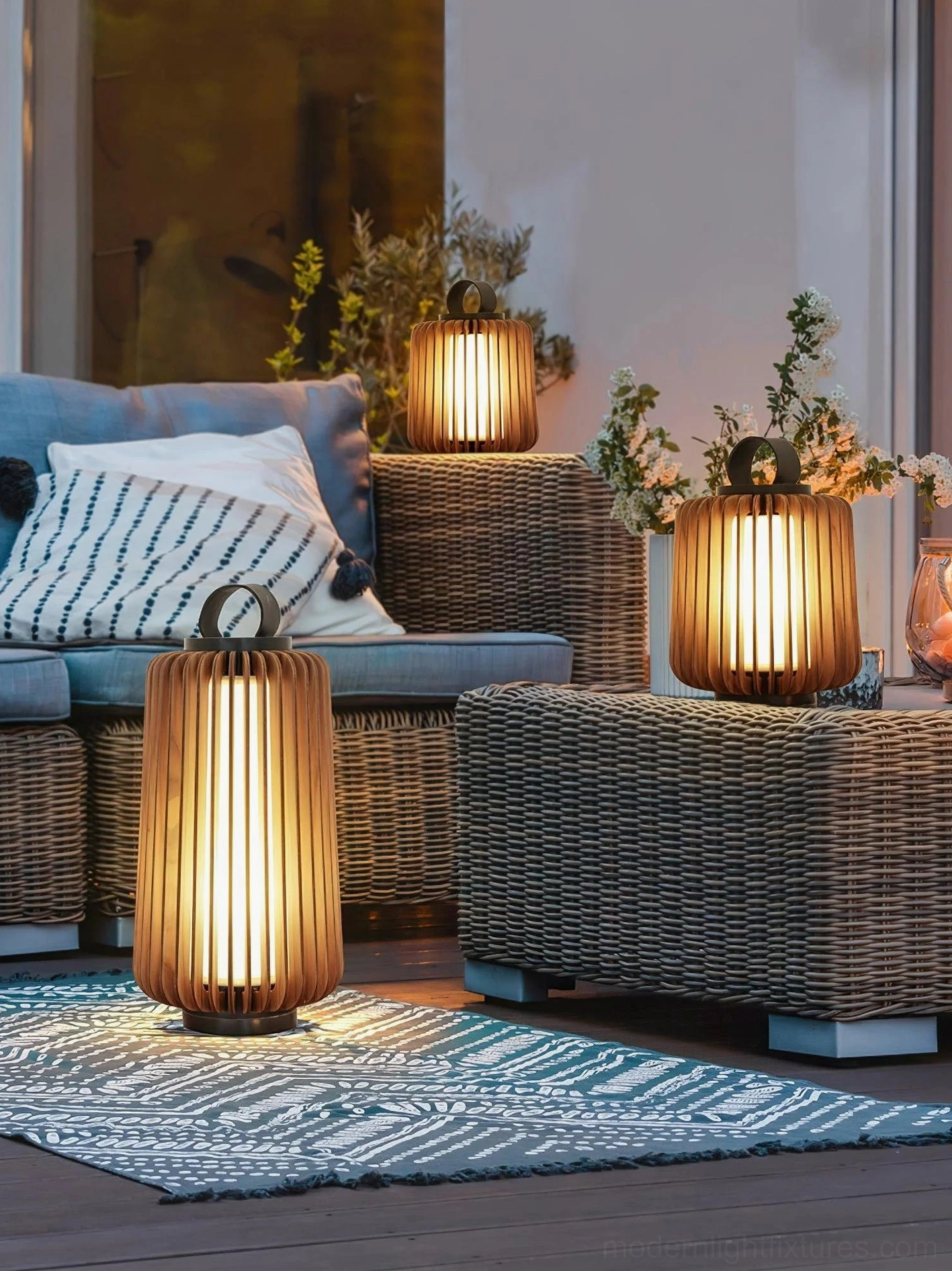 Mixed sizes of Lanvera rechargeable outdoor table lamps in rattan patio living space bohemian