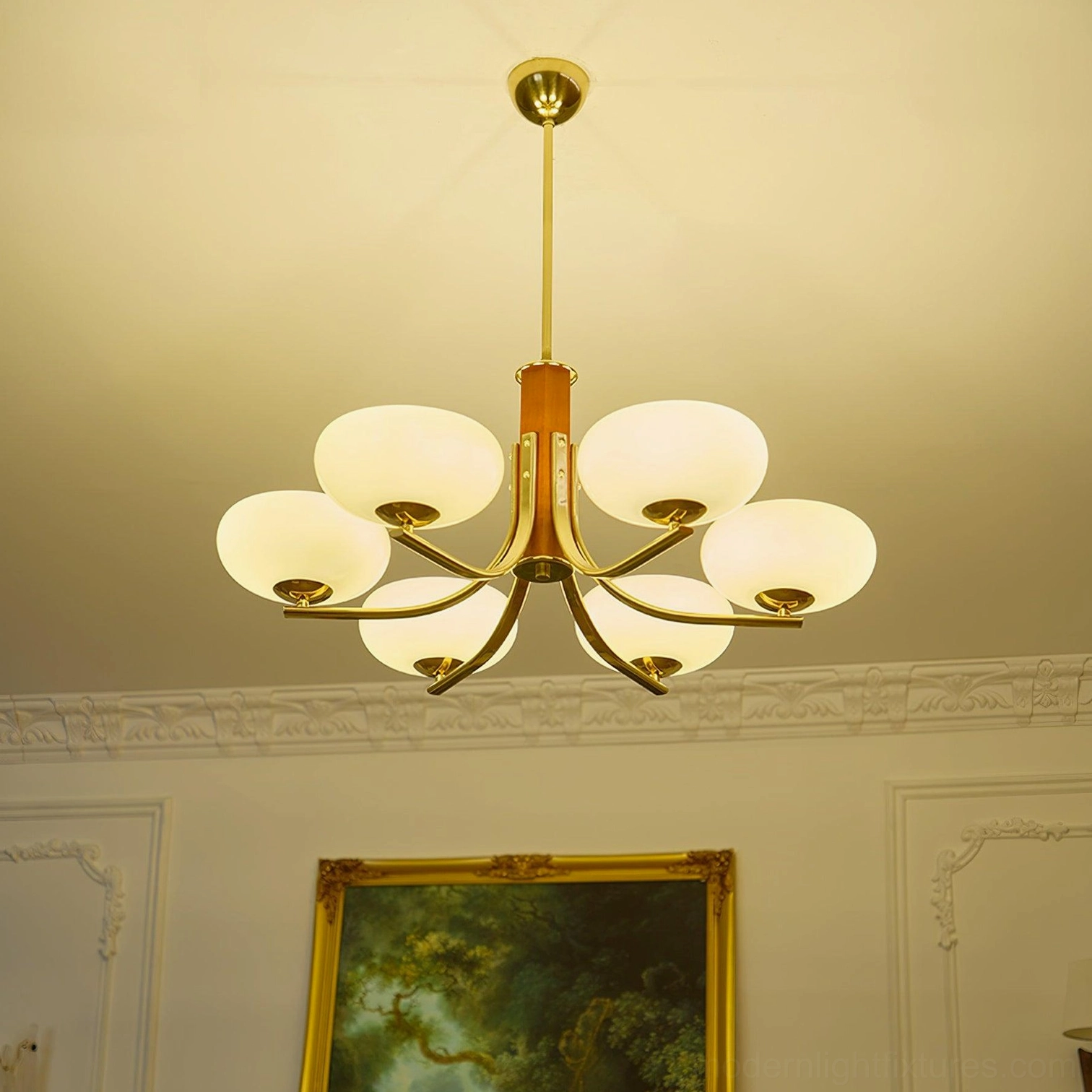 6-head sputnik chandelier installed in French-style living room with warm ambient lighting, brass metal and wood construction