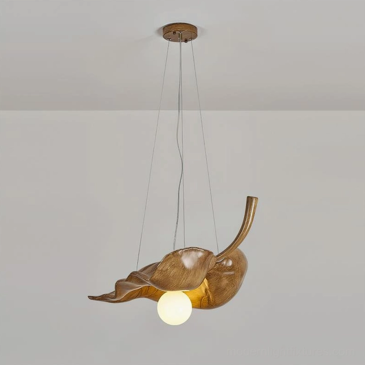 Large maple leaf pendant light in rich brown wood tone, resin shade with metal hardware
