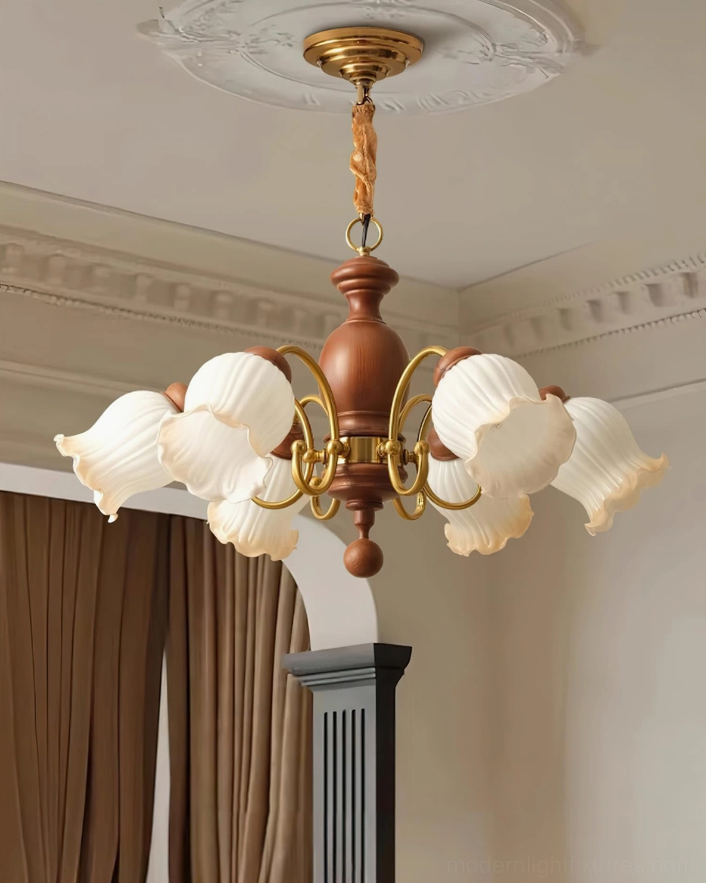 Large lily of the valley chandelier with brown wood and brass accents in vintage room setting