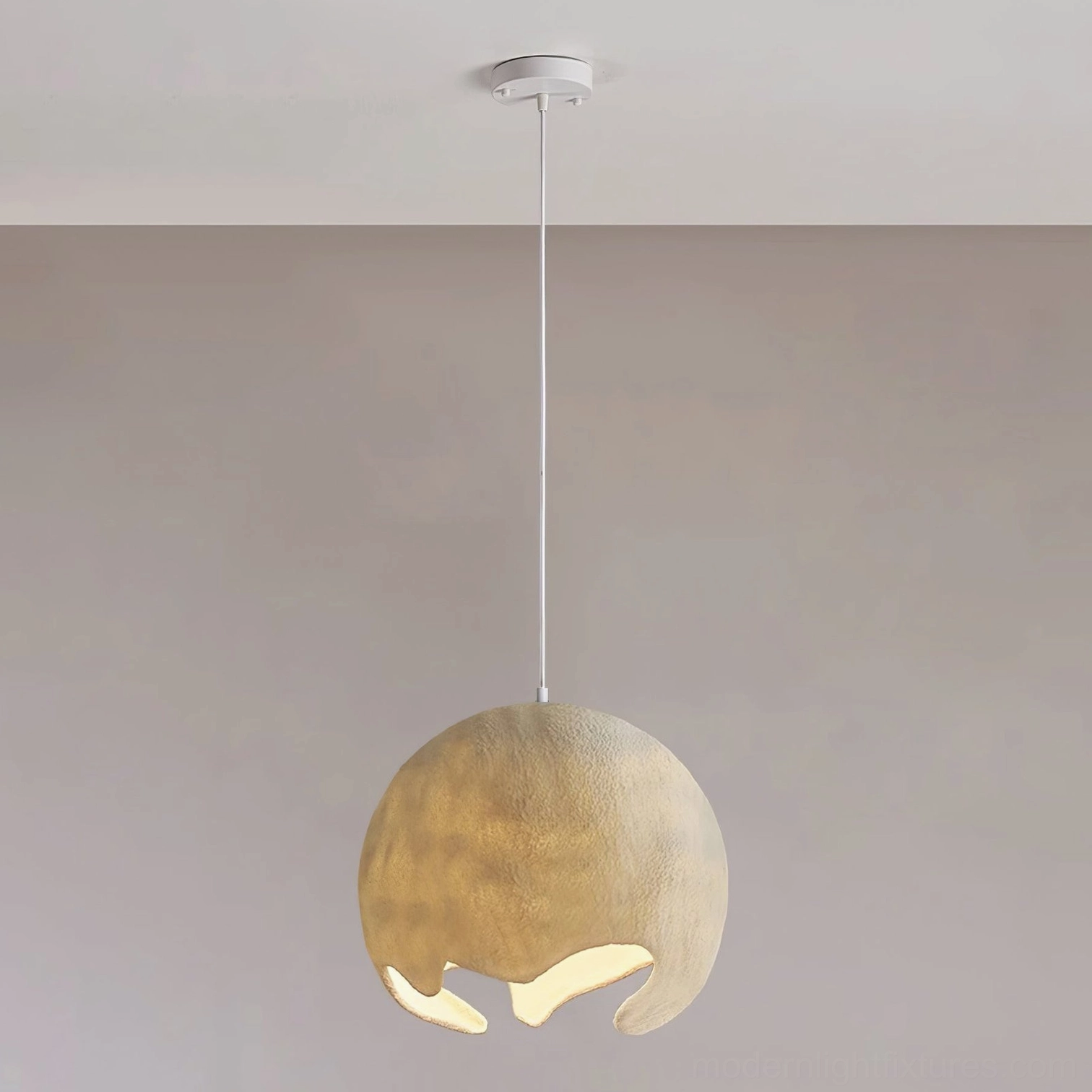 Large milk coffee moon crater pendant lamp with oversized textured resin sphere, bold statement ceiling light fixture modern design