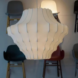 Large-scale cream white pleated pendant lamp in modern dining room furniture display