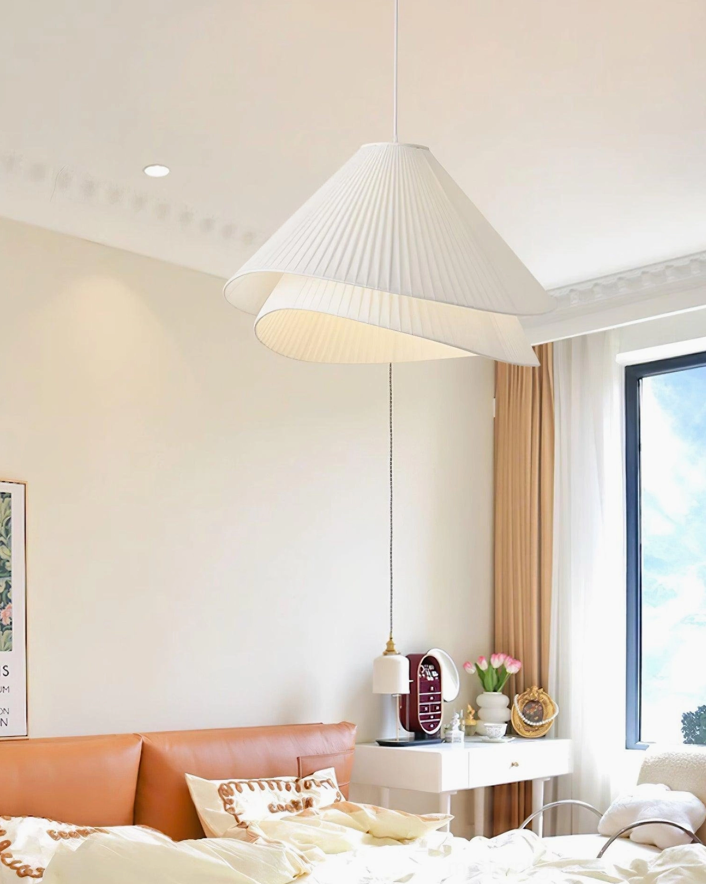 Large pleated fabric pendant light, scale reference in contemporary interior setting