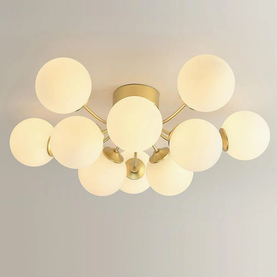 12-head large sputnik ball ceiling light fixture with extended brass gold arms and frosted shades