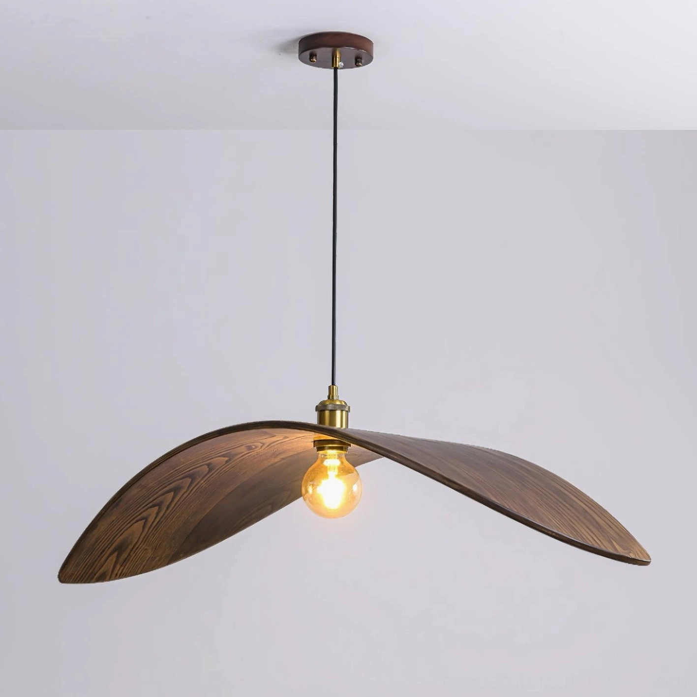 Large walnut leaf pendant lamp as statement piece in spacious modern living room or dining area