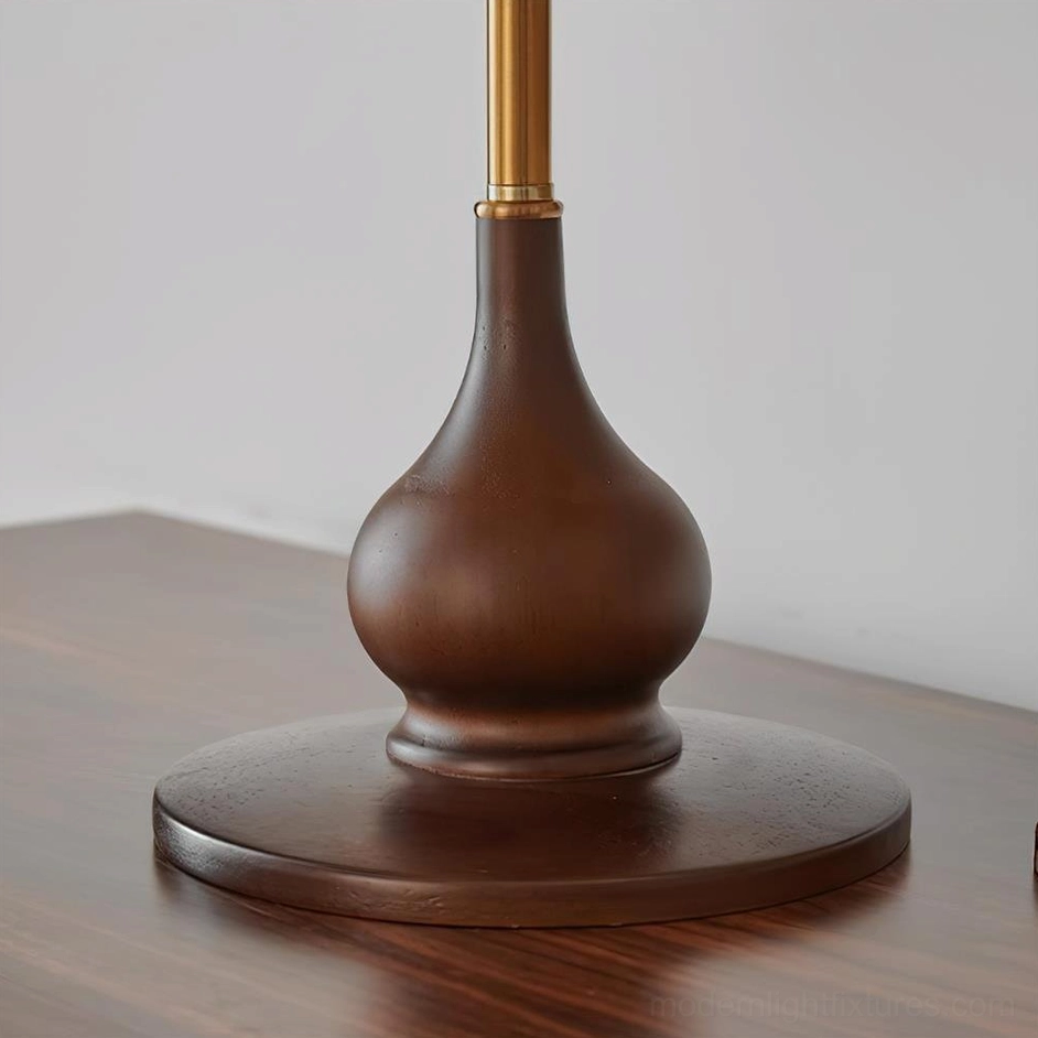 Lariat table lamp displaying warm ambient lighting and texture of hand-stitched leather