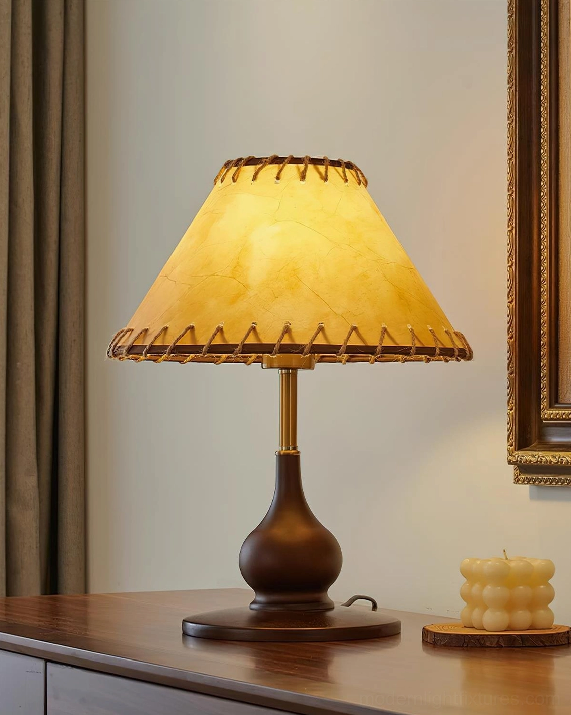 Lariat stitched leather table lamp on wooden table with artistic home interior styling