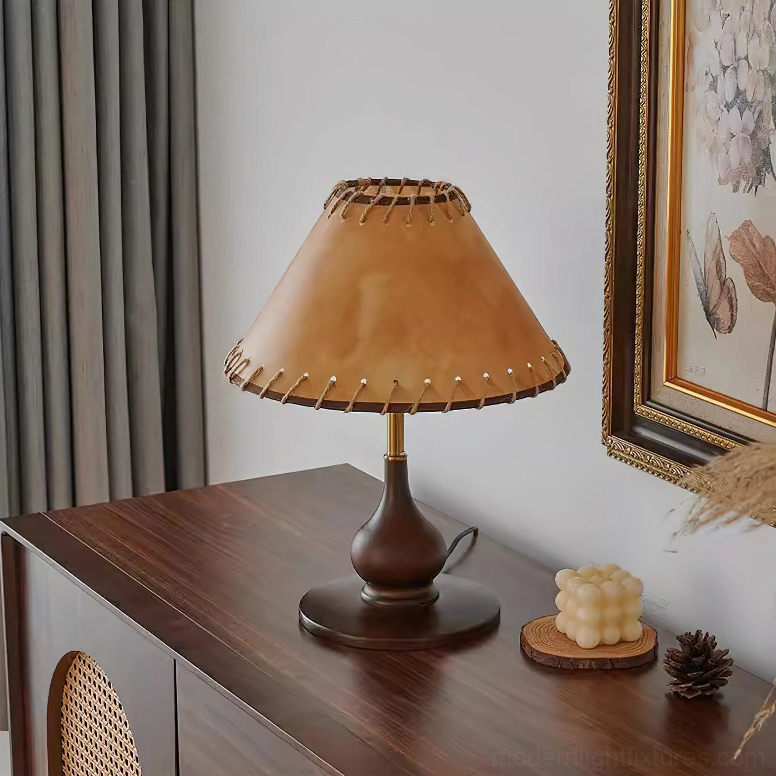Lariat table lamp displayed on rustic wooden side cabinet with warm ambient lighting and home decor