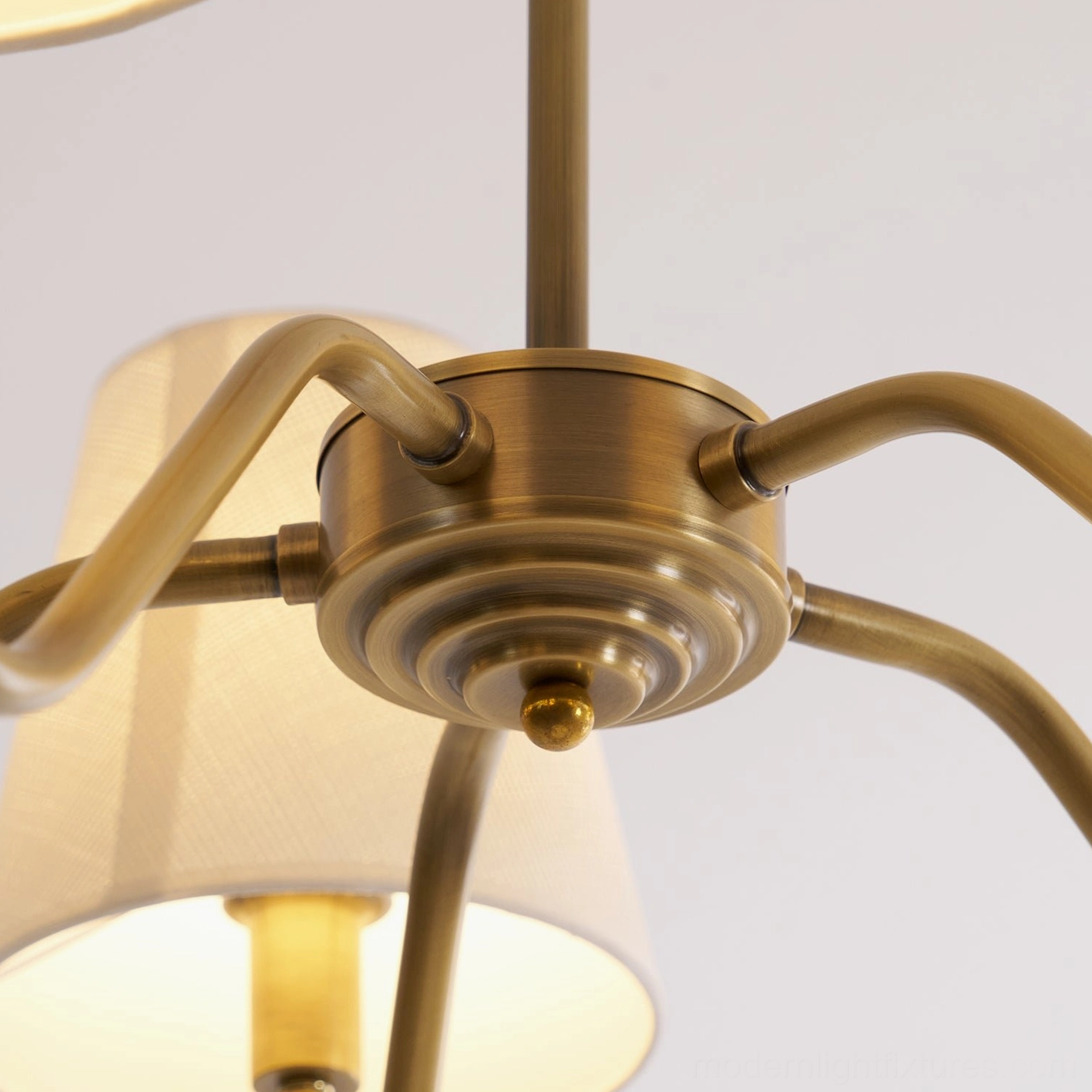 Lassen brass chandelier bottom view, shade arrangement, light distribution, fixture construction detail
