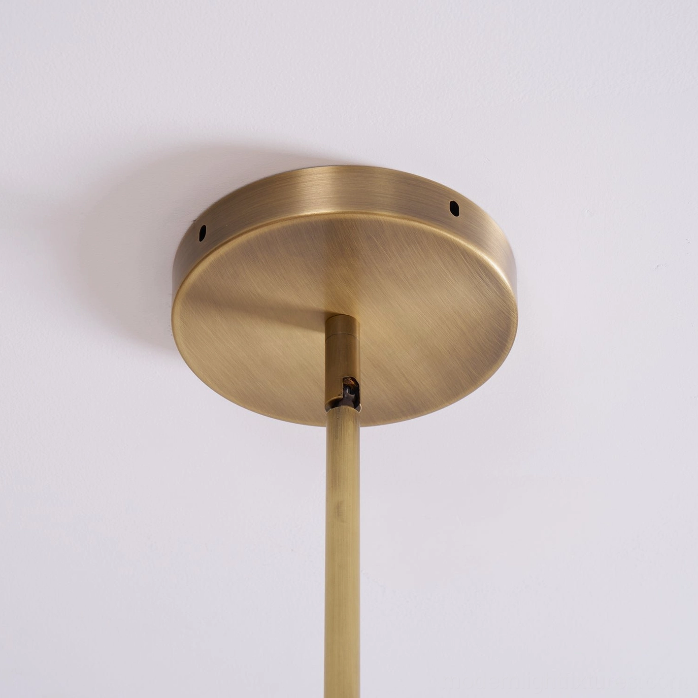 Lassen brass chandelier lifestyle photography, elegant home interior, sophisticated lighting design application