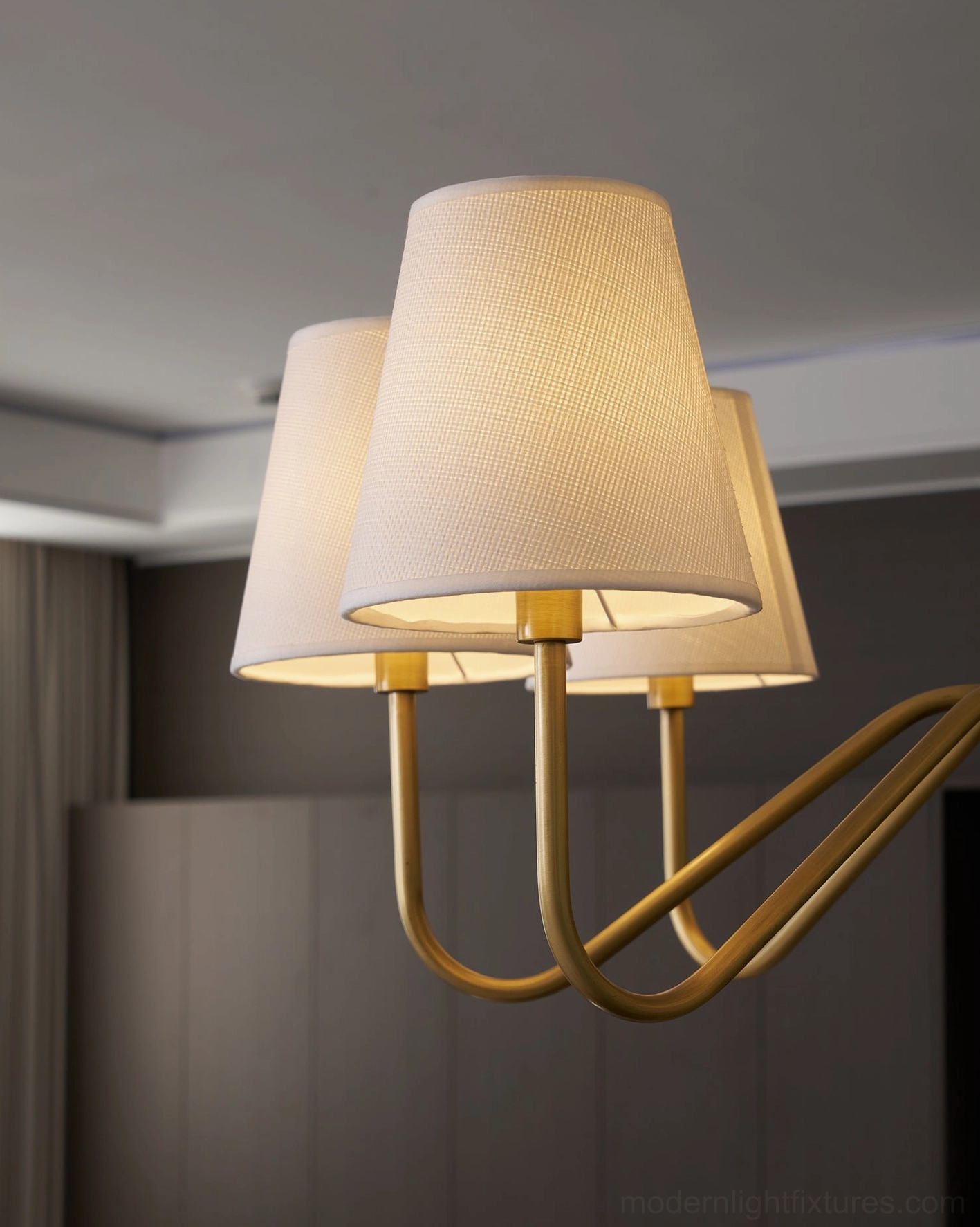 Lassen brass chandelier room setting, transitional interior design, modern minimalist home decoration