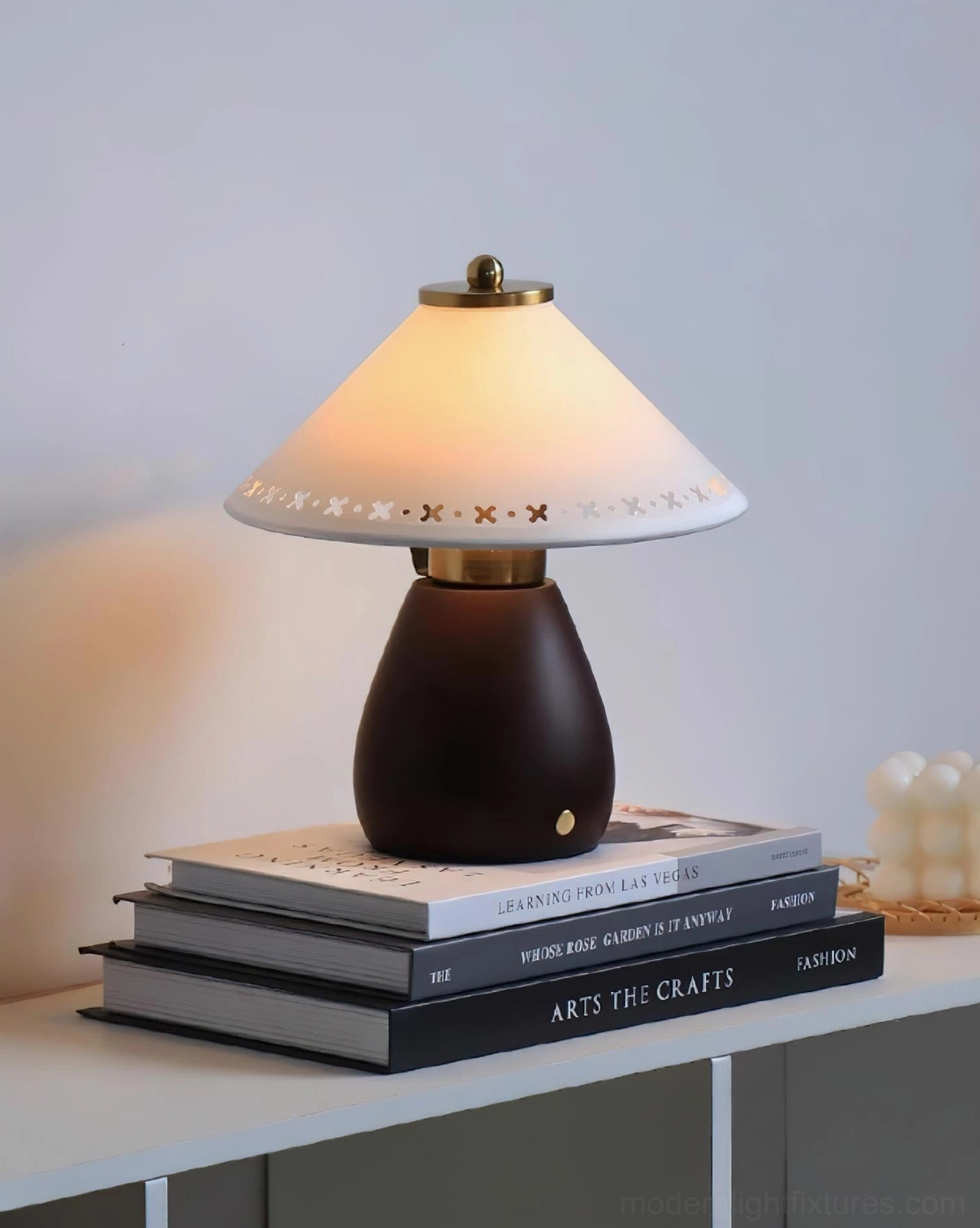 Lattice Table Lamp on shelf with books and candles, artisanal vintage charm with modern LED efficiency