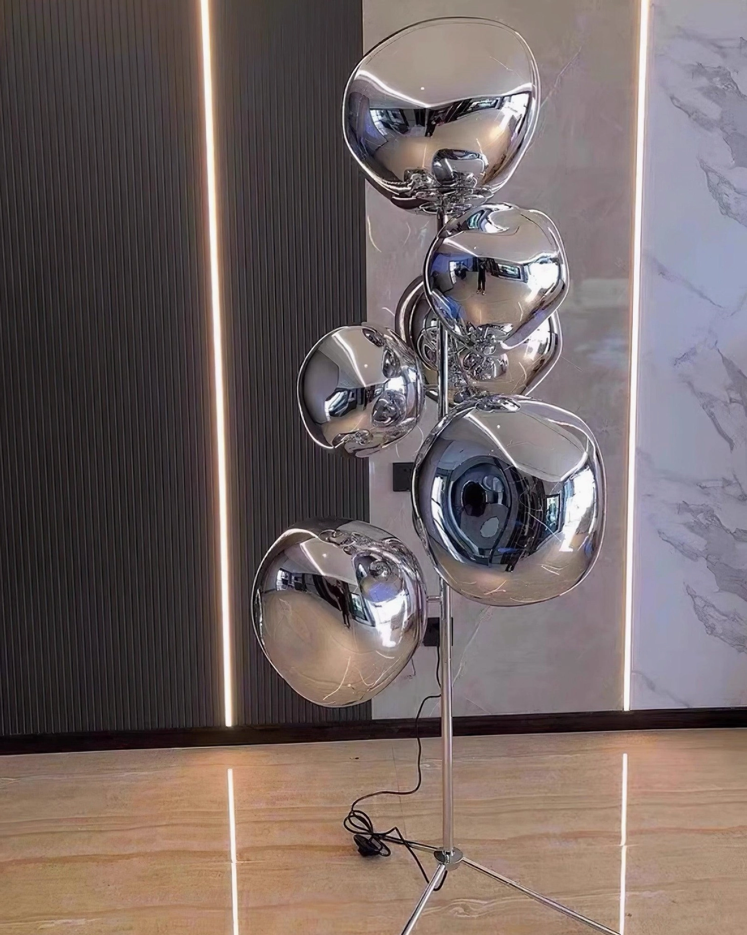 Lava bubble floor lamp in gallery space demonstrating artistic statement lighting piece