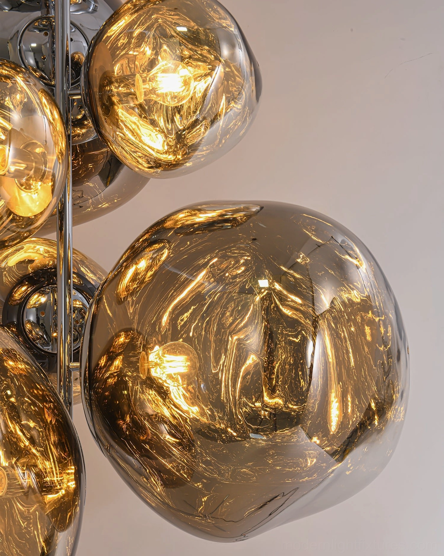 Large lava bubble floor lamp detail close-up of upper glass shade cluster illuminated
