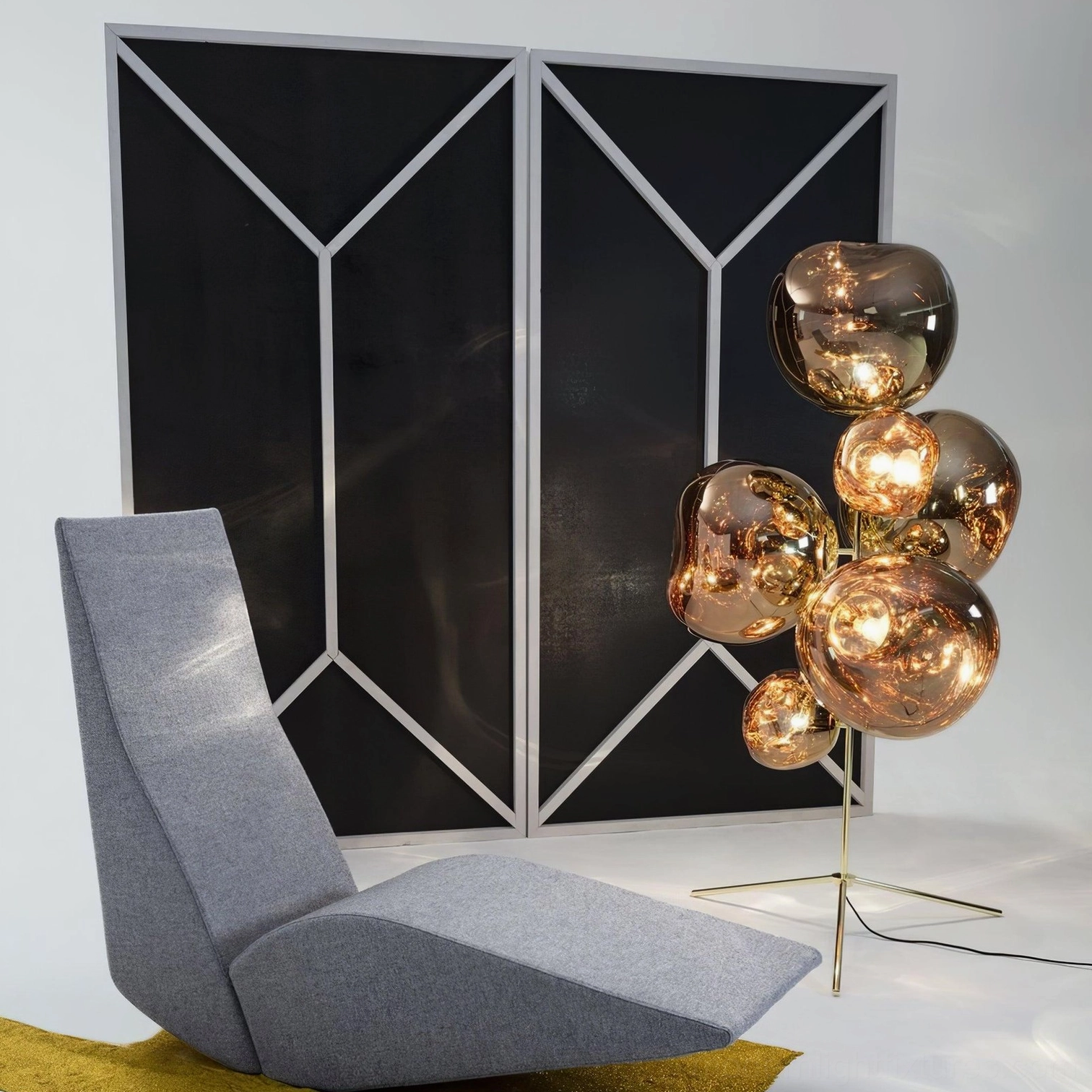 Contemporary bubble floor lamp unlit showing mirror-finish sculptural glass appearance