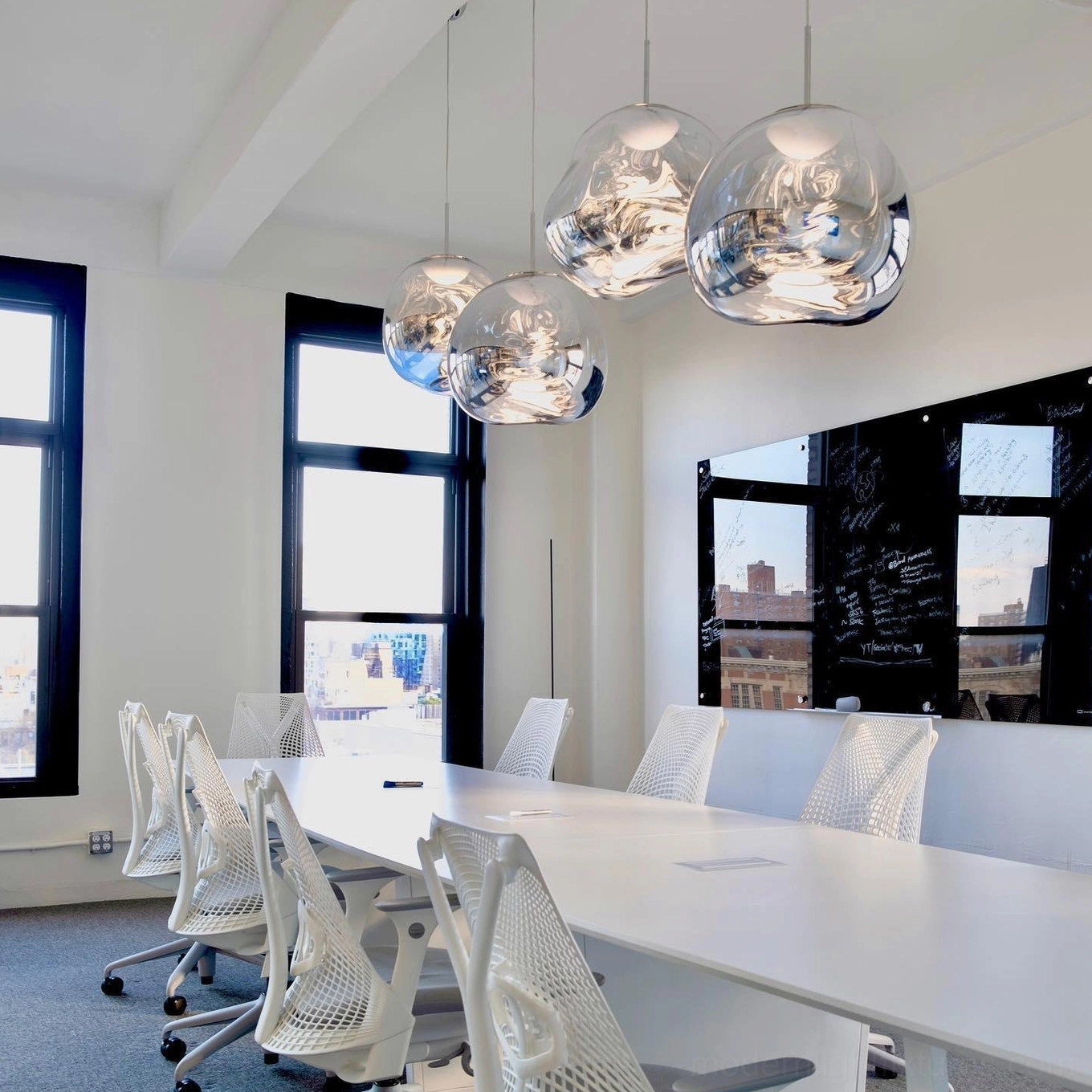 Pendant lamp with distorted mirror finish sculptural presence artistic lighting
