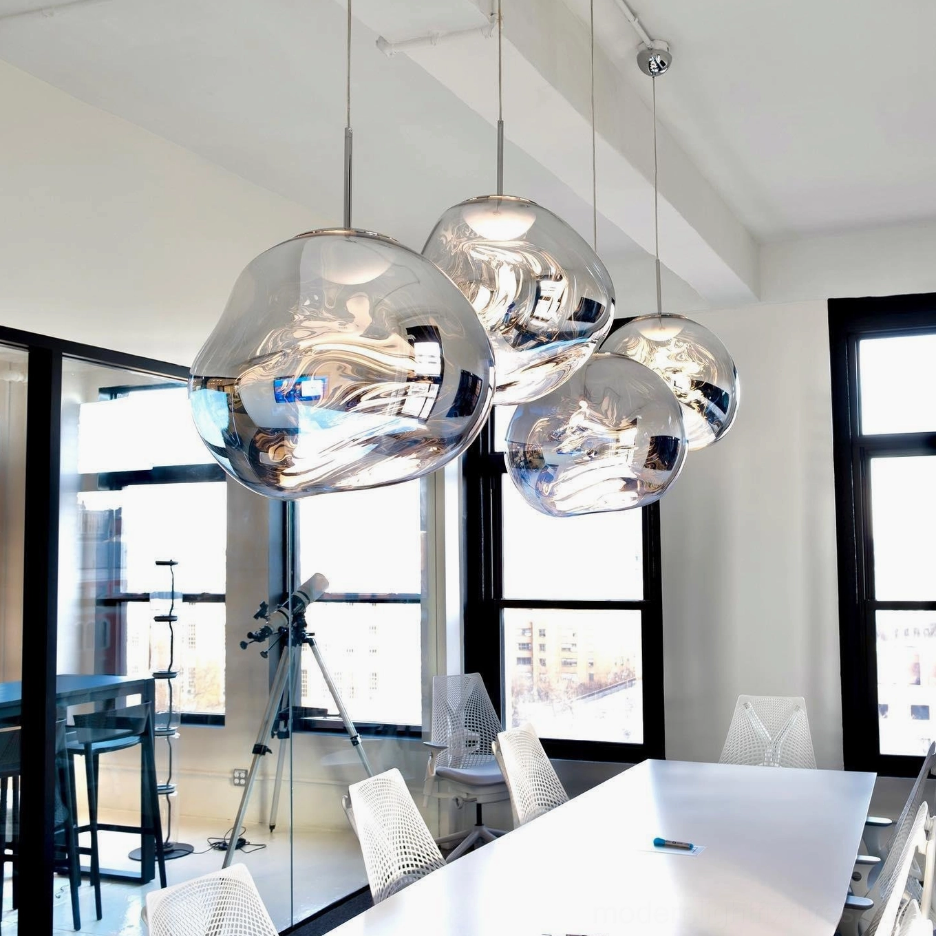 Modern metallic pendant lamp in residential ceiling installation