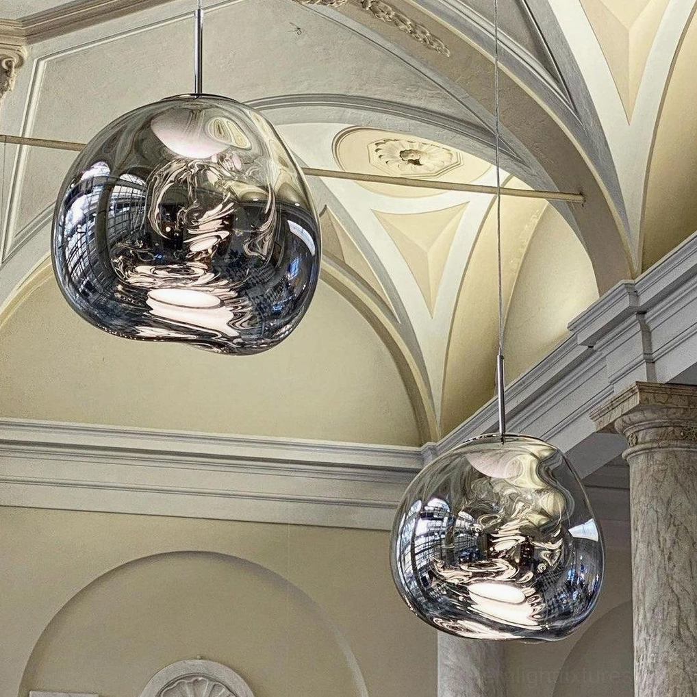 Pendant fixture metallic shade fractured light pattern artistic installation