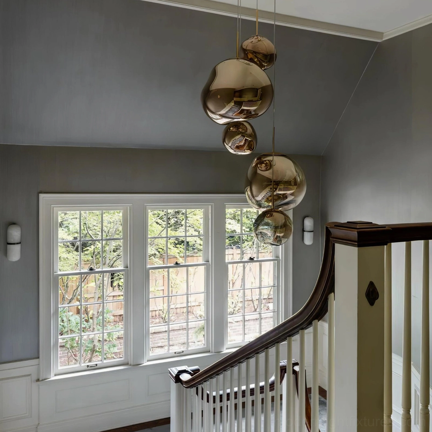 Contemporary pendant light metallic mirror shade fractured light projection