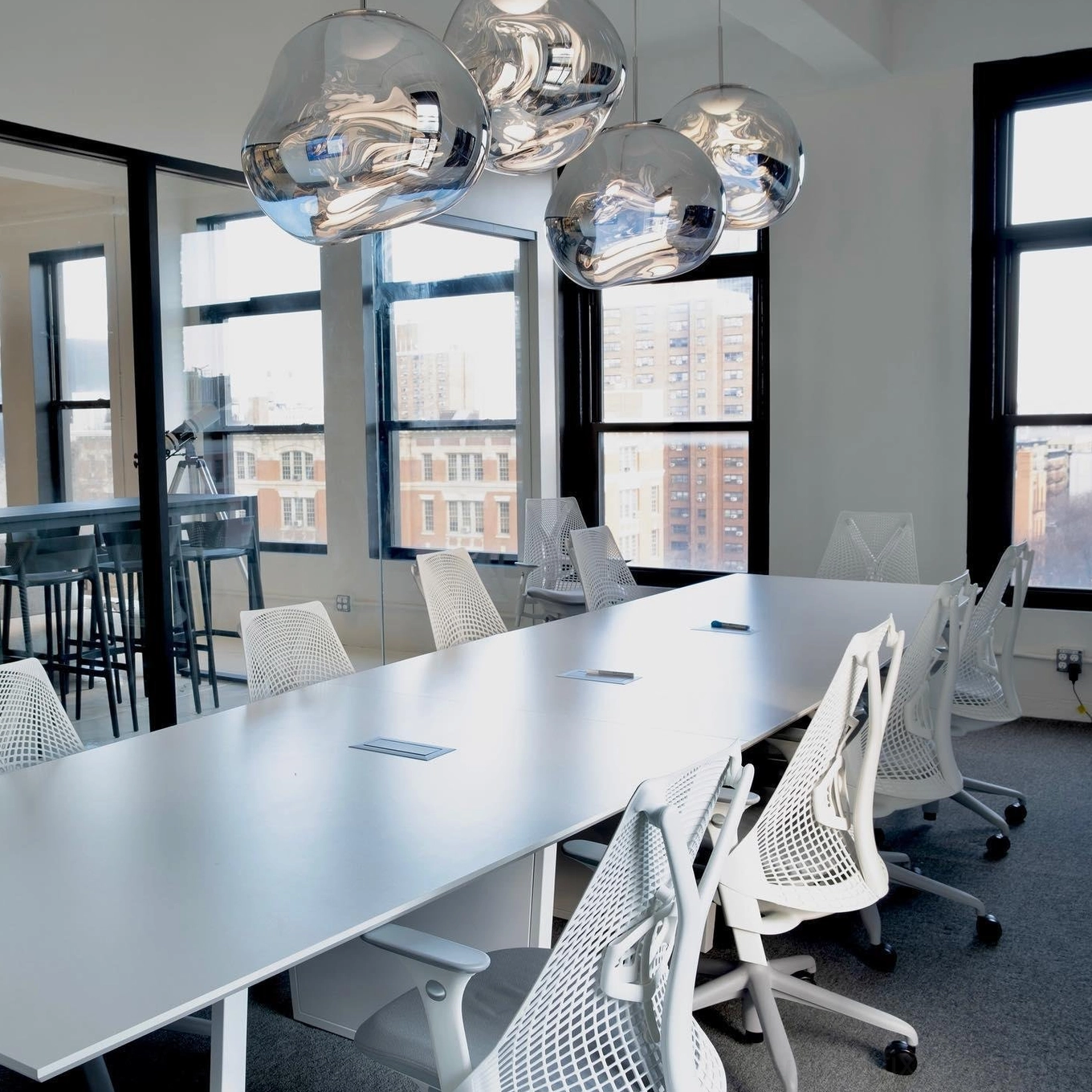 Contemporary pendant fixture with metallic shade in modern interior design