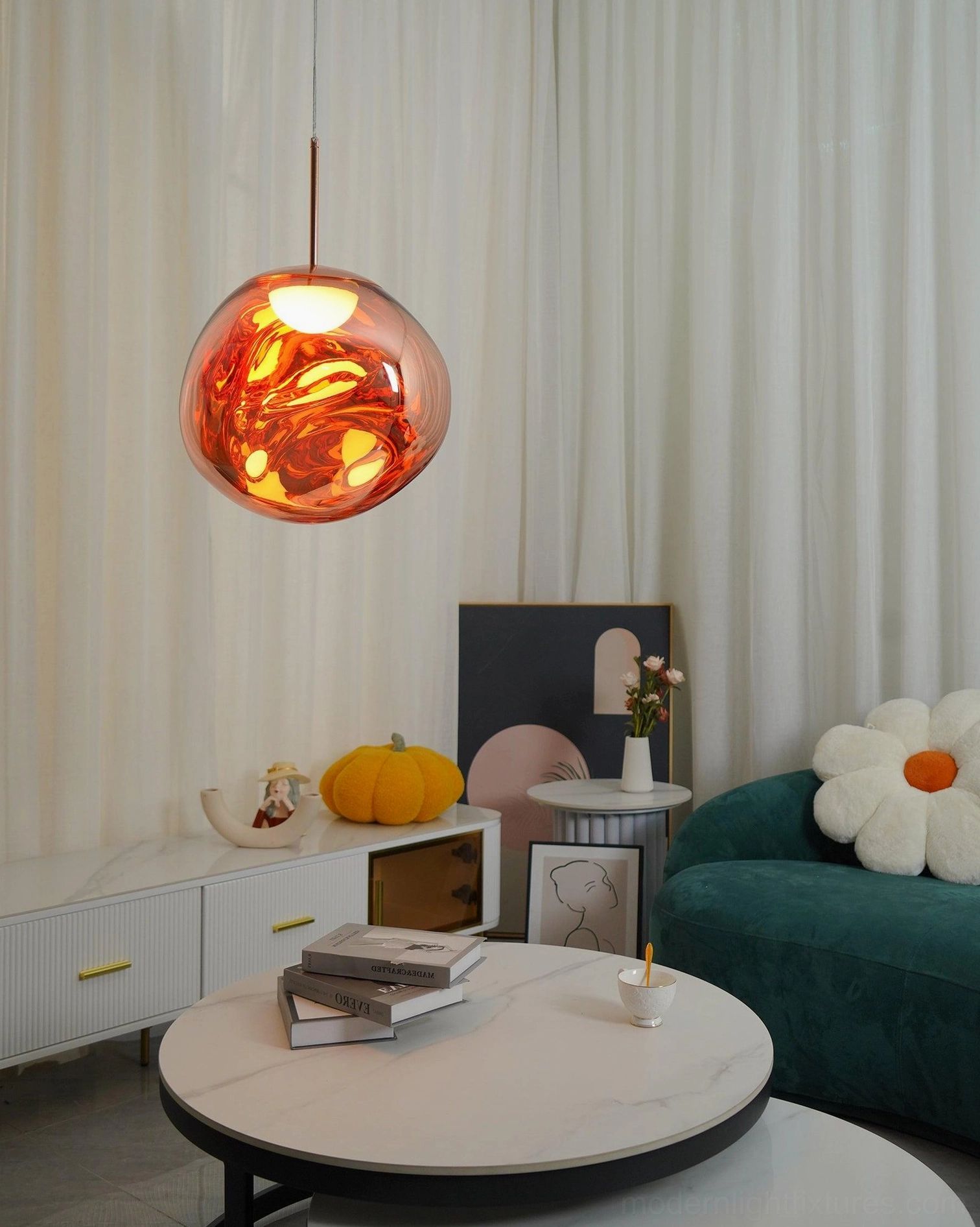 Pendant fixture distorted reflective surface fractured light installation