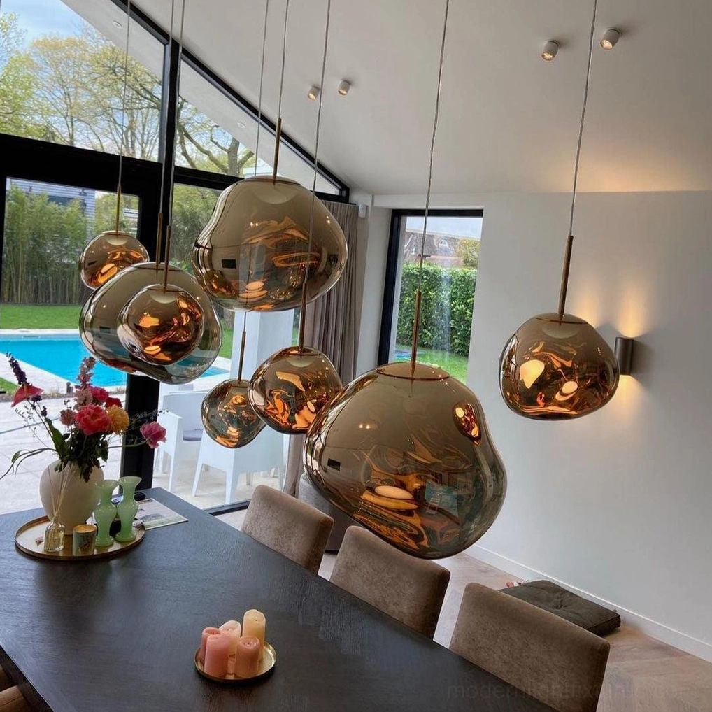 Contemporary metallic pendant shade sculptural form ceiling detail