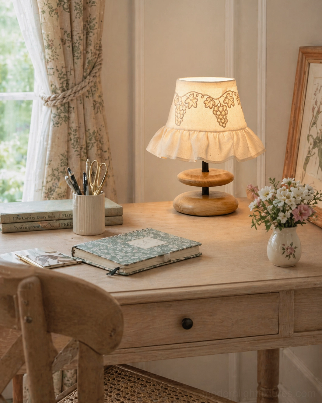 Lavelle ruffled table lamp home office desk setting with floral bouquet and stacked books