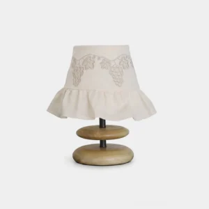 Lavelle pleated fabric table lamp with vine and grape embroidery detail frontal view studio shot