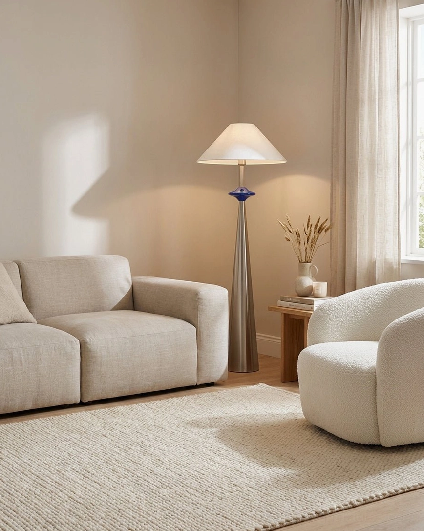 Lazuro floor lamp size comparison with standard armchair, demonstrating 63-inch height and 50cm shade diameter