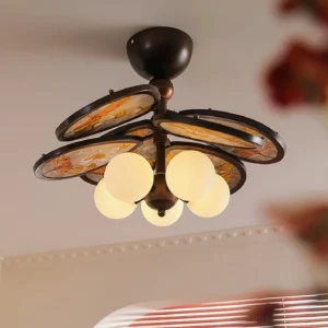 Lit Leafora vintage ceiling lamp with warm glowing globe bulbs and aged bronze finish floral decorative discs in home setting