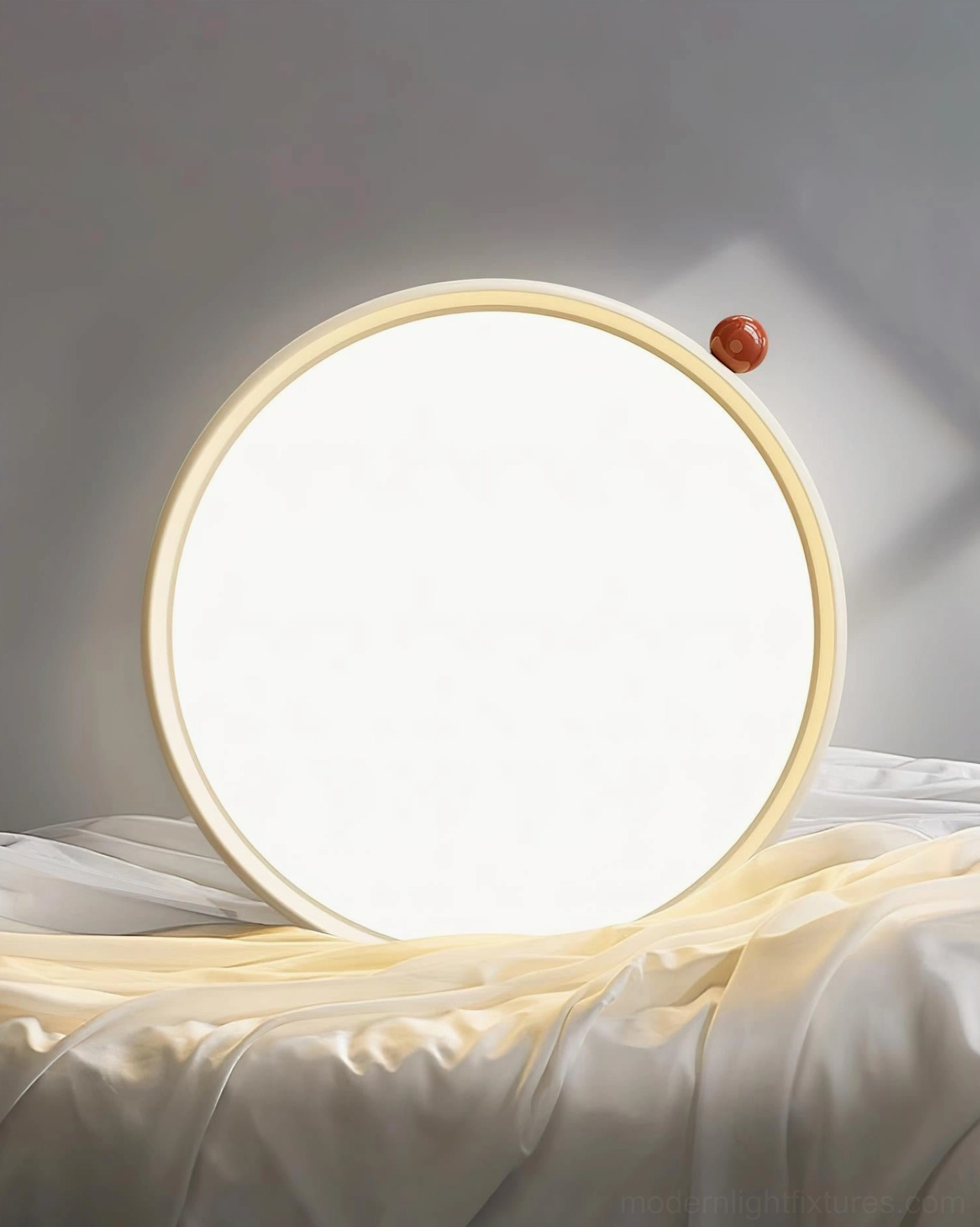 Close-up detail of LED ceiling light fixture showing light wood grain frame and illuminated acrylic diffuser