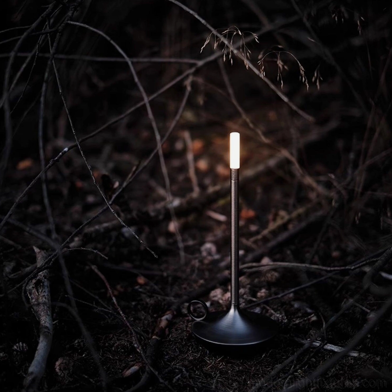 Contemporary LED table lamp base showing USB charging capability and durable aluminum construction details
