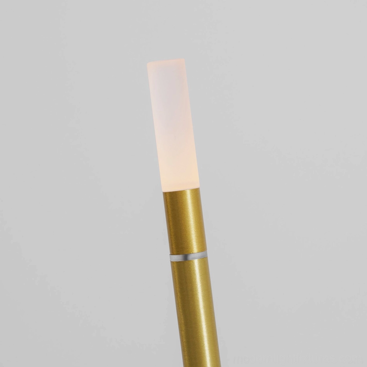 Contemporary LED candle table lamp creating curated gallery-like shelf styling and display presentation