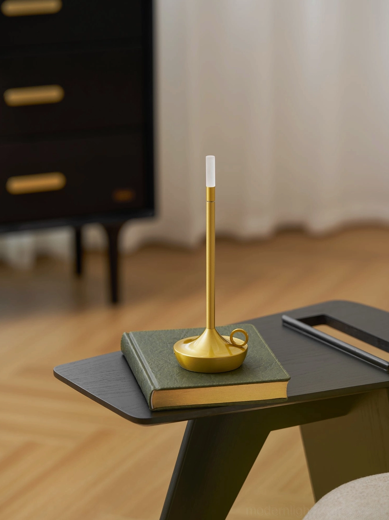 Modern minimalist LED candle table lamp creating warm ambient lighting effect in 3000K color temperature