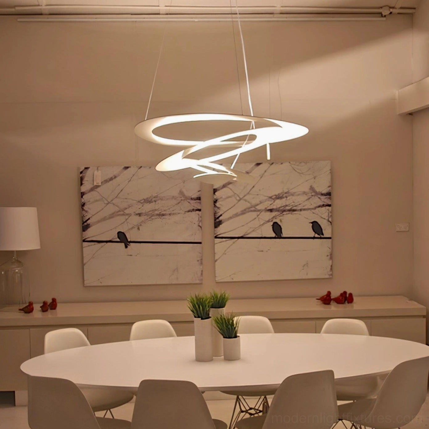 LED spiral pendant light fixture showing warm 3000K color temperature in residential dining space