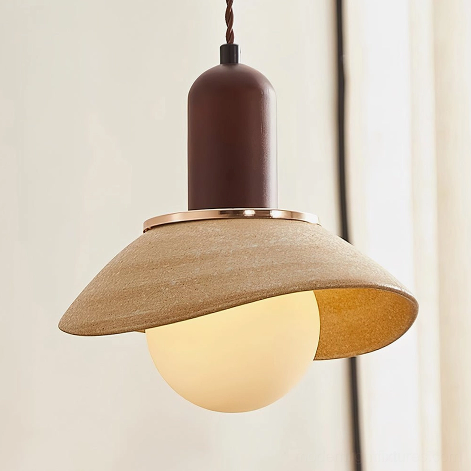 Detailed view of Legro pendant light with illuminated warm glow showing matte wood grain ceramic finish
