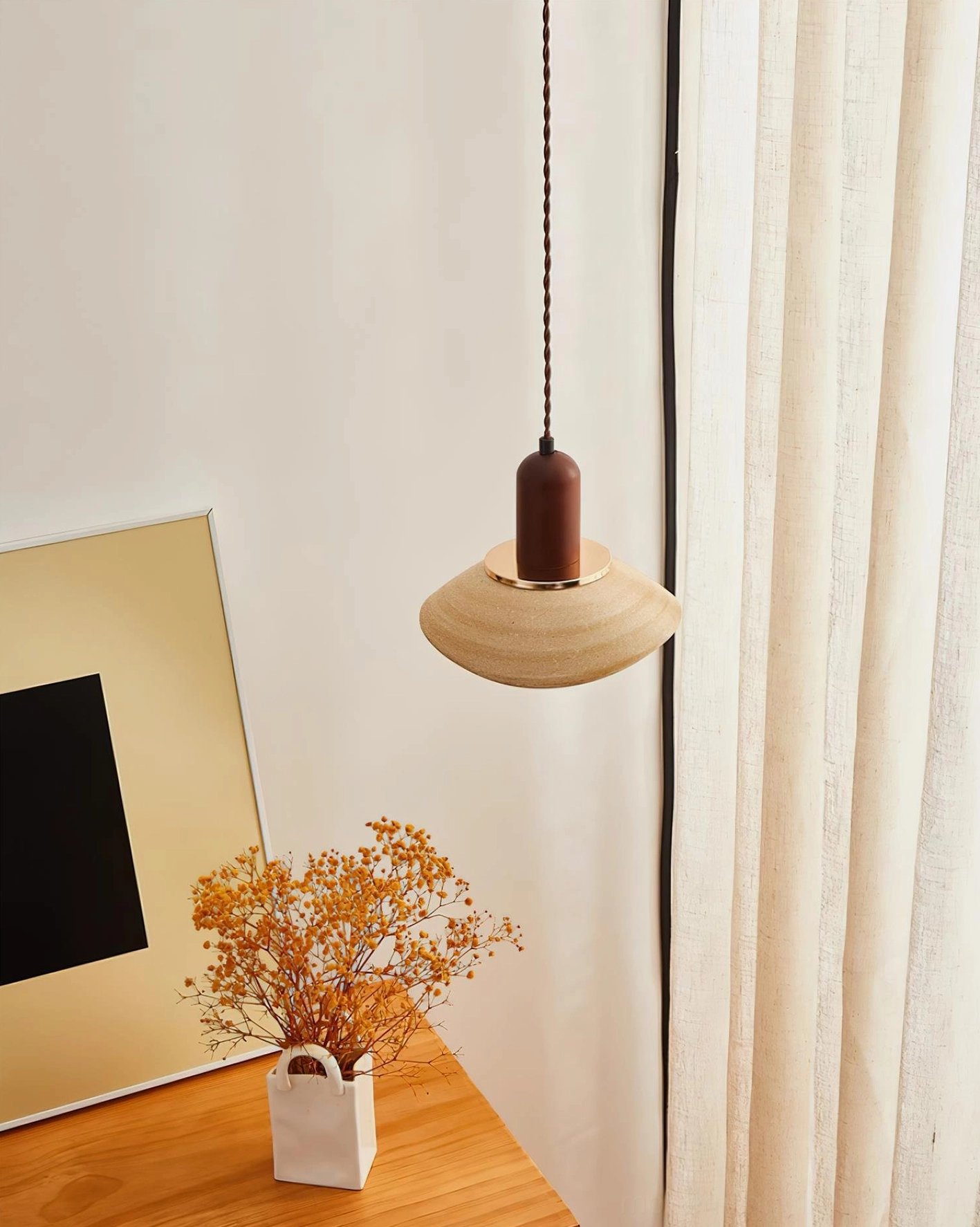 Rear side view of Legro pendant light showing walnut wood fixture and textured ceramic shade design
