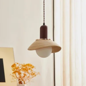 Walnut and beige Legro pendant light in cozy home interior with natural lighting and dried flower decor