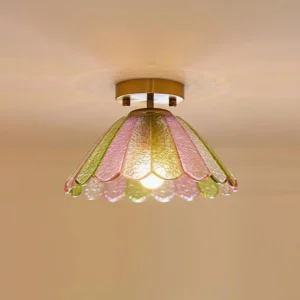Illuminated Leira ceiling light fixture overhead view showing warm ambient lighting and textured glass petal design