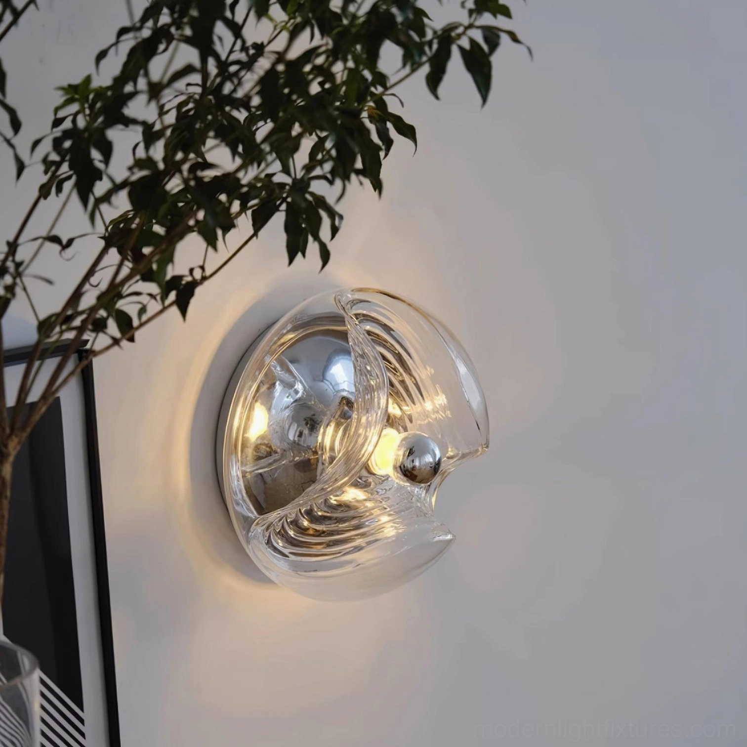 Glass wave wall sconce next to bathroom mirror damp-rated installation