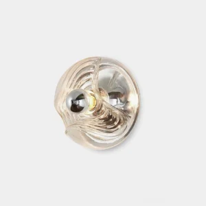 Leisa wave glass wall sconce with swirl pattern front close-up view against white background