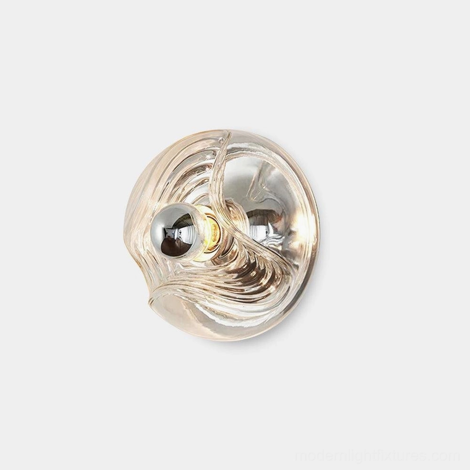 Leisa wave glass wall sconce with swirl pattern front close-up view against white background